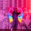 Cool woman posing infront of Three coloured Angel Wings LED neon sign