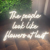 The People Look Like Flowers at Last LED Quote Sign