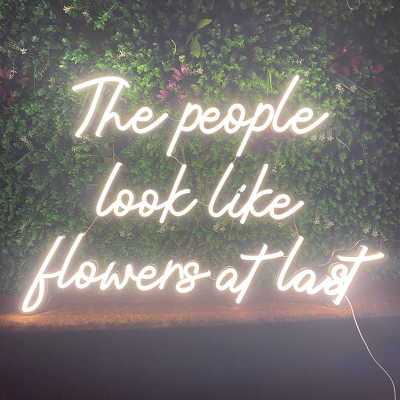 The People Look Like Flowers at Last LED Quote Sign